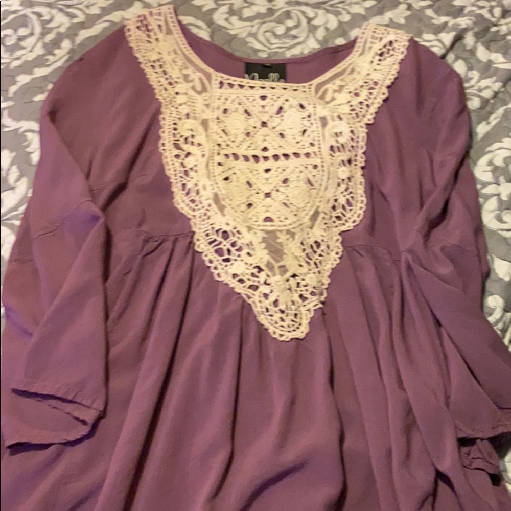 Purple long sleeve shirt.